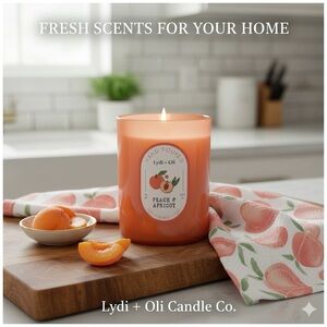 Peachy kitchen towels and matching peach & apricot scented candle